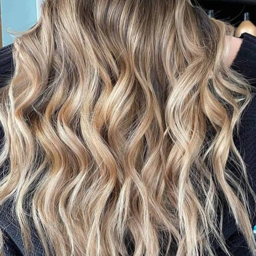 Ashy Blonde Balayage with Wavy Finish Near Alpine Avenue MI