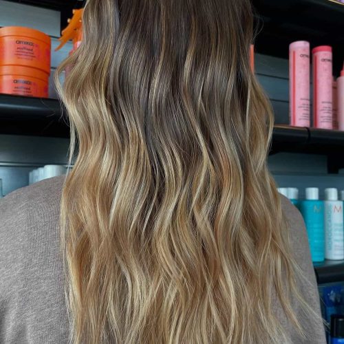 Rooted Blonde Balayage with Dimensional Waves Near Walker MI
